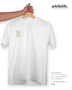 T-shirt 'Trust God' Branca
