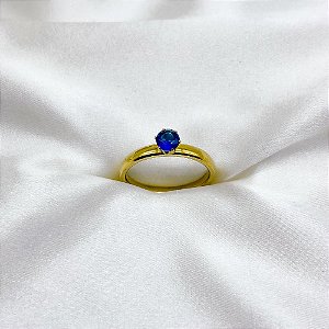 ANEL TIPO SOLITÁRIO DOURADO - PEDRA AZUL (UNIDADE)