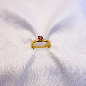 ANEL TIPO SOLITÁRIO DOURADO - PEDRA VERMELHA (UNIDADE)
