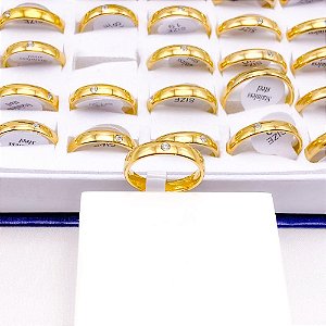 ALIANCA ACO INOXIDAVEL LISA COM PEDRA ZIRCONIA DOURADA 4MM - UNIDADE