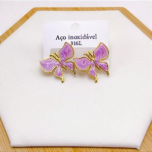 BRINCO AÇO INOX BORBOLETA RESINADO DOURADO - LILÁS