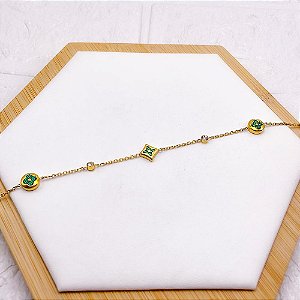 PULSEIRA AÇO INOX TREVO VERDE COM PEDRA CRISTAL - DOURADA