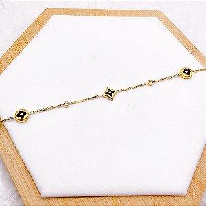 PULSEIRA AÇO INOX TREVO PRETO COM PEDRA CRISTAL - DOURADA