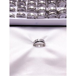 ALIANÇA AÇO INOXIDÁVEL ROTATIVA LISA COM PEDRA CRISTAL 6MM  - PRATEADA (UNIDADE)