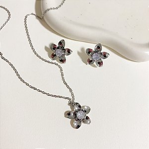 Conjunto flor aço inox detalhe em zircônia