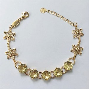 PULSEIRA FOLHEADA A OURO - BANHADO COM 5 MILÉSIMOS + VERNIZ DIAMOND - PULSEIRA COM BASE DE ALTA FUSÃO E ZIRCÔNIAS AMARELAS E FLORES VAZADAS 10MM - TAMANHO: 18CM - FECHO LAGOSTA (OURO676) OUPS0000101