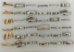 KIT ANEL E ALIANÇA EM AÇO INOXIDÁVEL E MODELOS DIVERSOS E NUMERAÇÃO DE 13 ATÉ 33 KIT COM 36 UNIDADES (6 UNIDADES AÇO DOURADO) ACKI000036