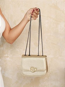 Bolsa dourada de alça corrente