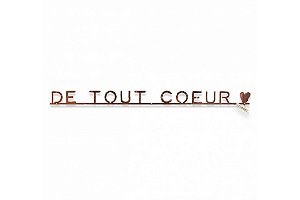 Frase em ferro 'De tout coeur'