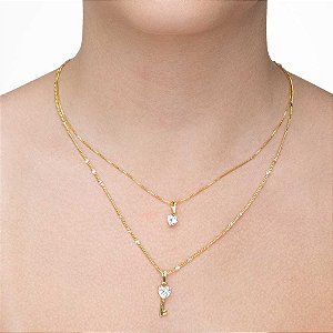 Colar duplo com ponto de luz e chave folheado a ouro