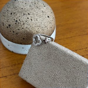 Anel Flor e estrela estilo falange. Modelo regulável em Prata 925.