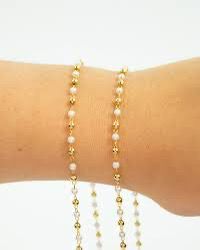 PULSEIRA ESFERAS E PEROLAS BANHO OURO