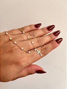 PULSEIRA CRUCIFIXO COM PÉROLAS