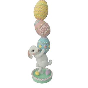 COELHO DECORATIVO PÁSCOA SEGURANDO OVOS COLORIDOS