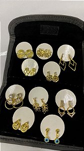 Estojo de pano com variações de brincos. Modelo 04