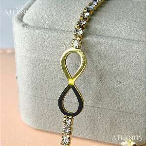 Pulseira Dourada Infinito Cravejada