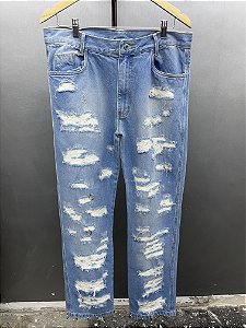 Distressed piercing denim