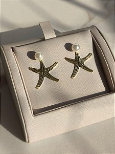 Brinco estrela do mar banho ouro 18k