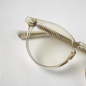 Óculos redondo transparente dourado
