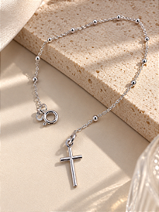 Pulseira cartier com bolinhas e cruz na ponta