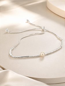 PULSEIRA COM REGUL. TUBINHO COM PEROLA EM PRATA