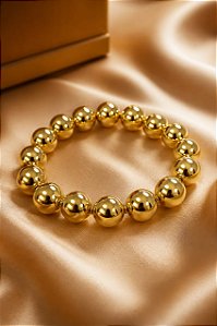 PULSEIRA ELASTICA COM ESFERAS UNIDADE 18K