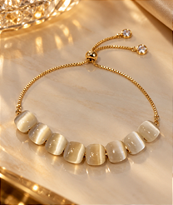 BRACELETE REGUL 8 PEDRAS QUADR OLHO GATO