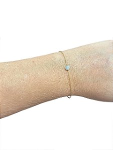 PULSEIRA PONTO DE LUZ CRAVEJADO DE ZIRCÔNIA FOLHEADO A OURO