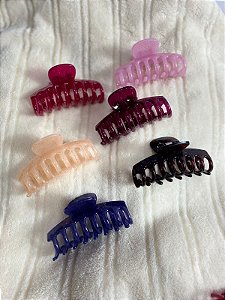 Piranha de cabelo em plástico