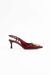 SLINGBACK VANUCIA EM VERNIZ COM ACESSÓRIO ORGÂNICO