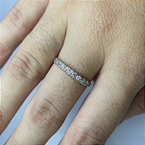 ANEL MEIA ALIANÇA COM ZIRCÔNIAS EM PRATA 925