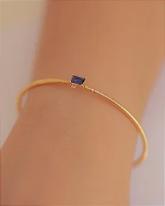 Pulseira Bracelete com Cristal Retangular Azul Safira no Dourado