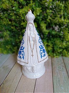 Imagem de Nossa Senhora Aparecida em Porcelana com Filete de Ouro e Flores