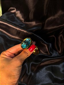 Plug Redondo Dourado com Pedra Azul