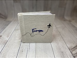 Capa em linho com bordado Viagem