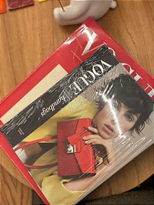 Vogue essentials: HANDBAGS- CAROLYN