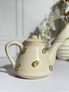 Bule artesanal boca dourada