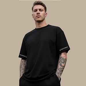 CAMISETA OVERSIZED VERSÍCULO TESSALONICENSES 5:18