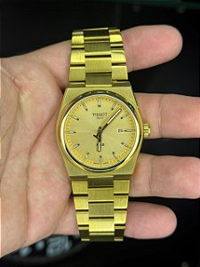TST - PRX DOURADO MOSTRADOR DOURADO