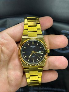TST - PRX DOURADO MOSTRADOR PRETO