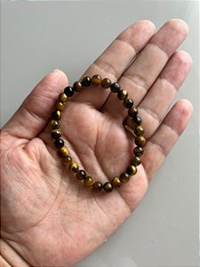 Pulseira esfera 6mm Olho de Tigre – Proteção, Coragem, Foco e Poder Pessoal