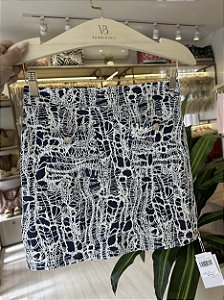 Saia bolsinho com botão denim