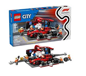 BOXE DE F1 E EQUIPE NO BOXE COM CARRO DA FERRARI