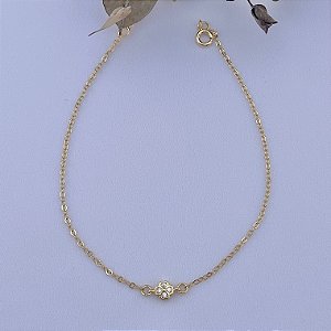 Tornozeleira em banho de ouro 18k com pingente mini trevo de quatro folhas cravejado
