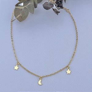 Tornozeleira em banho de ouro 18k com pingentes de estrela e lua