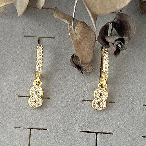 Argola cravejada pingente infinito em banho de ouro 18k