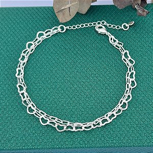 Pulseira dupla de elos cartier e elos de coração vazado em banho de prata silver