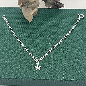 Pulseira infantil com flor cravejada em banho de prata silver