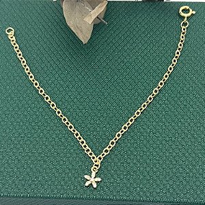 Pulseira infantil com flor cravejada em banho de ouro 18k