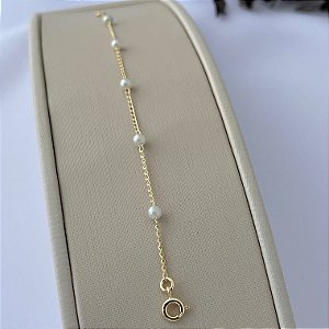 Pulseira infantil de pérolas em banho de ouro 18k